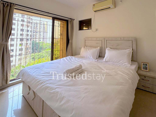 Bedroom 1 of TrustedStay Panch Smruti Building Service Apartment in Powai, Mumbai